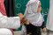 Kepresiedenan Umum Urusan Dua Masjid Suci Bagikan Gelang Ke Anak-anak Agar Tidak Tersesat